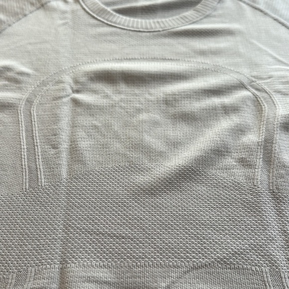Lululemon, short sleeve top , gray color , size 8 , good condition - Picture 2 of 3